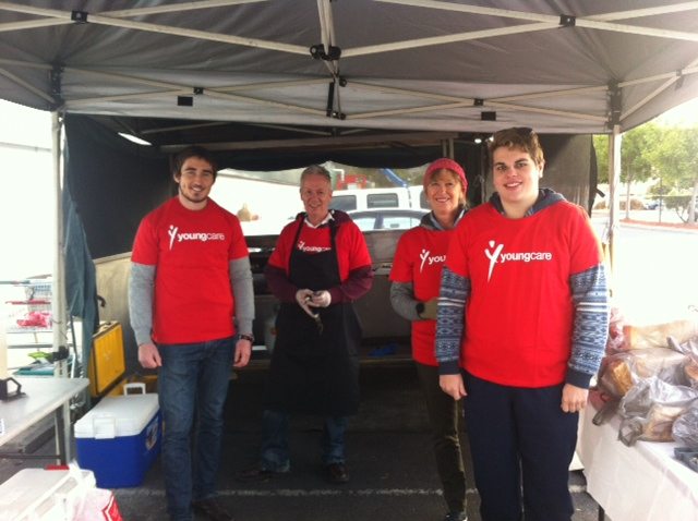 Four Youngcare volunteers at a Bunnings BBQ
